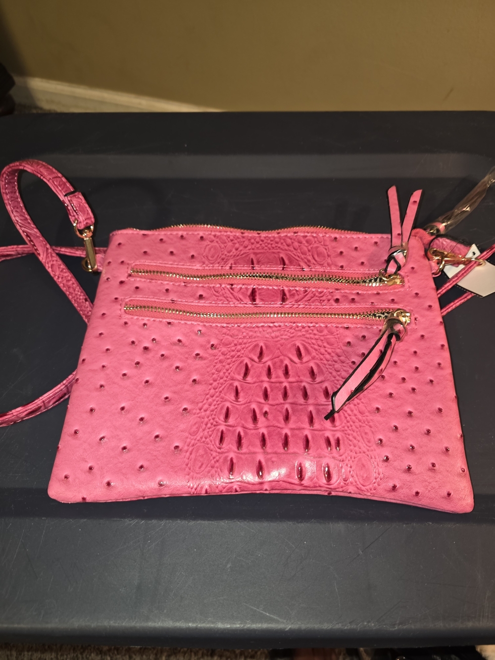 Stylish Pink Crossbody Bag with Gold Zippers
